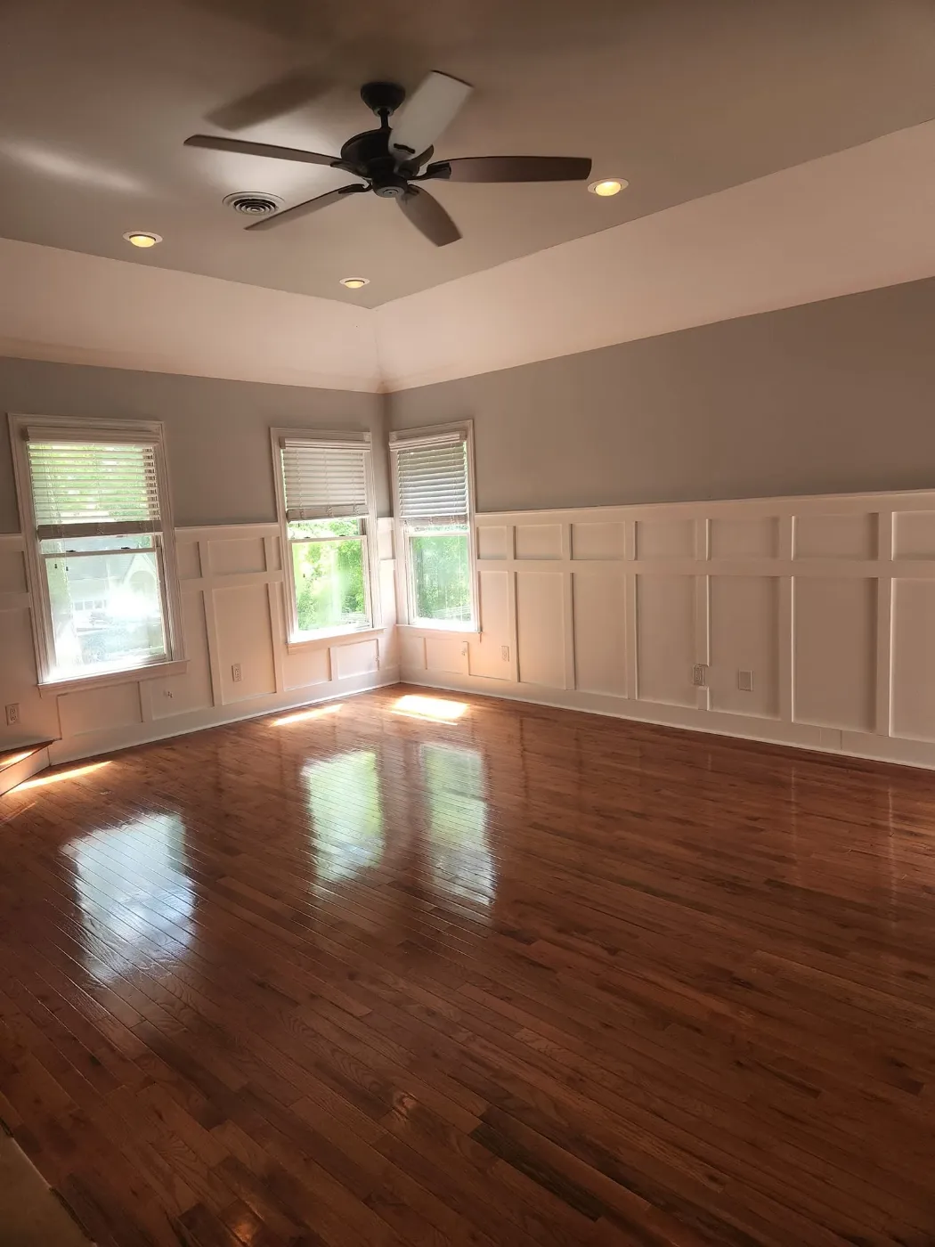 Bright room with polished hardwood floors, cleaned by Dust Free By DD in Cleveland, TN