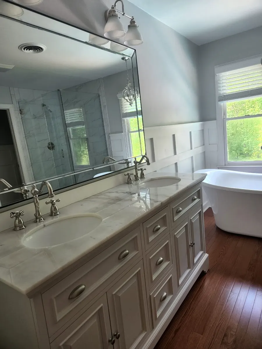 Double vanity, mirror and fixtures polished, cleaned by Dust Free By DD in Cleveland, TN