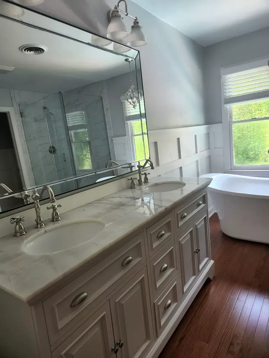 Double vanity, mirror and fixtures polished, cleaned by Dust Free By DD in Cleveland, TN