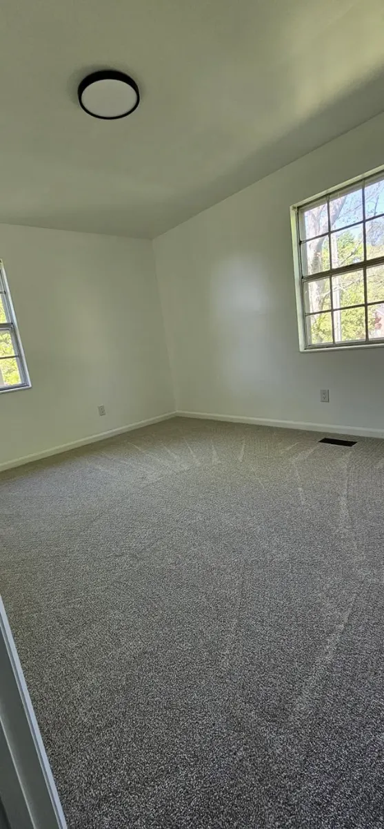 Empty bedroom ready for move-in, cleaned by Dust Free By DD in Cleveland, TN