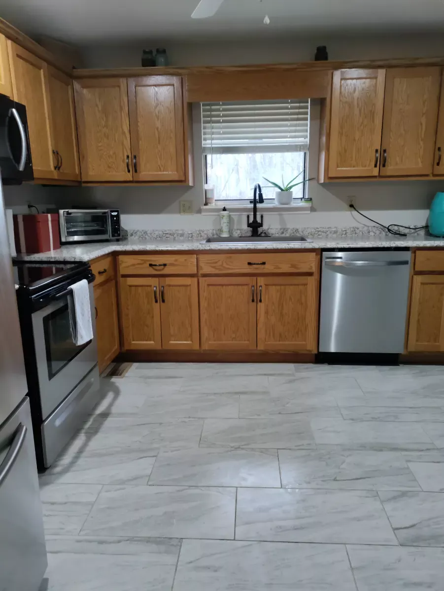 Kitchen, stove and tile floors cleaned, cleaned by Dust Free By DD in Cleveland, TN