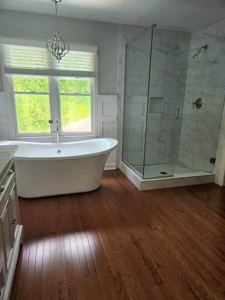 Soaking tub and glass shower left spotless, cleaned by Dust Free By DD in Cleveland, TN