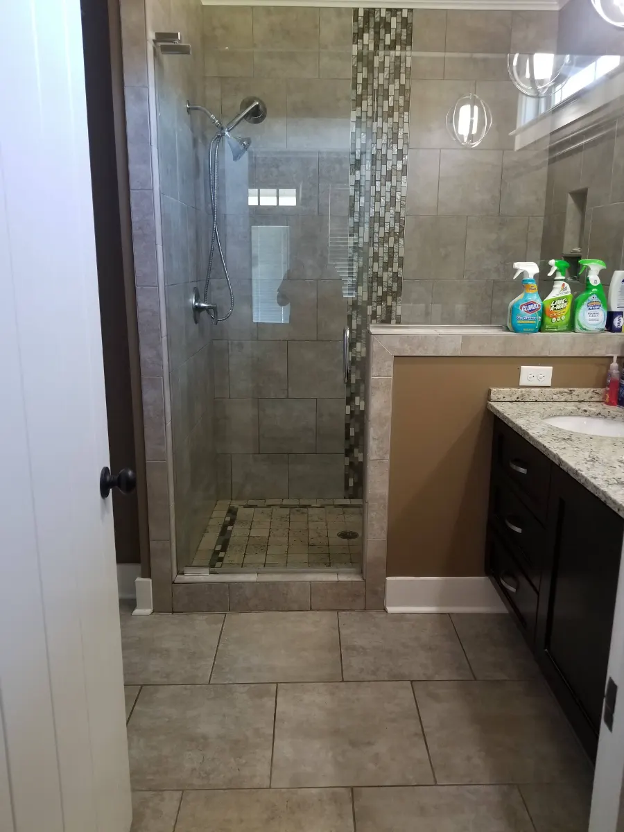 Tiled walk-in shower scrubbed clean, cleaned by Dust Free By DD in Cleveland, TN