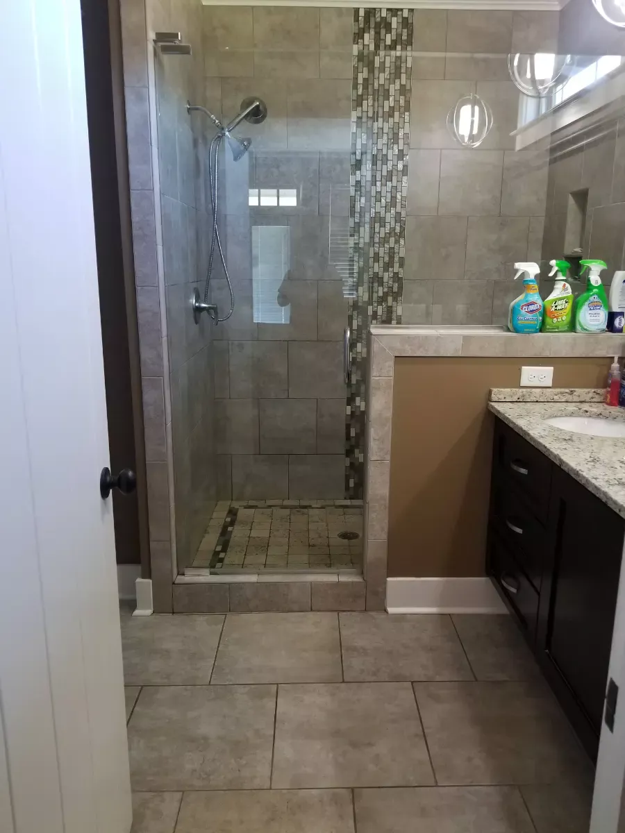 Tiled walk-in shower scrubbed clean, cleaned by Dust Free By DD in Cleveland, TN